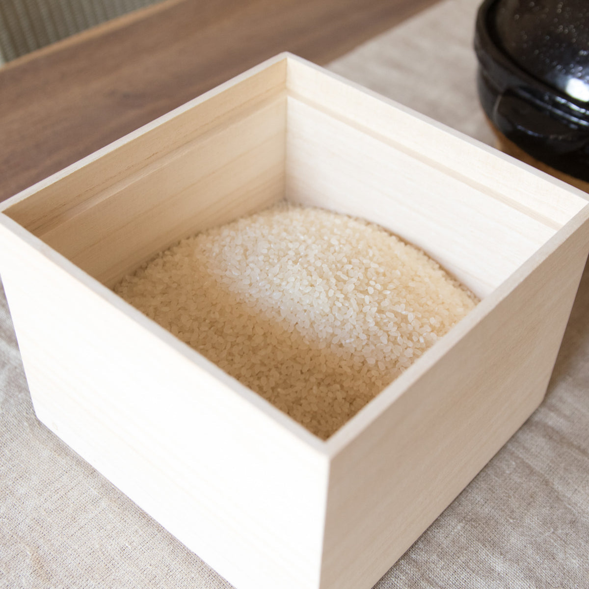 Exuding warmth, this simple, stackable rice bin is made by Masuda Kiribako, a specialist shop founded in 1929, and features an ingenious lid